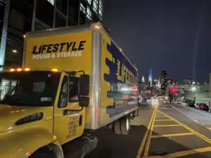Lifestyle Moving & Storage truck parked at night