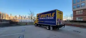 Lifestyle Moving & Storage truck beside the New York City waterfront